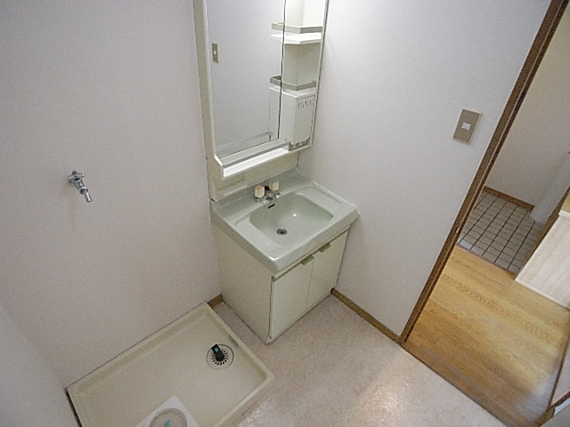 Washroom. It is indoor washing machine Storage.