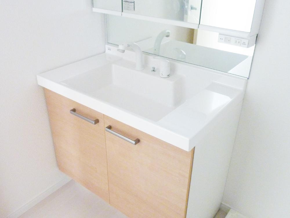 Wash basin, toilet. Bathroom vanity