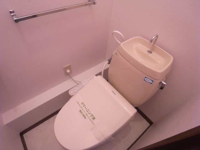 Toilet. It comes with a warm water toilet seat