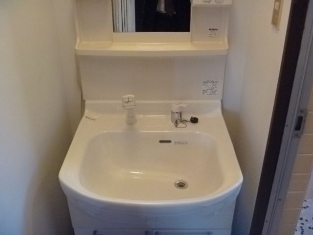 Washroom. It was shampoo dresser installation. 