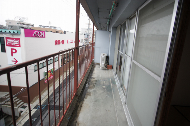 Balcony. Veranda is big because it connected to the two rooms. 