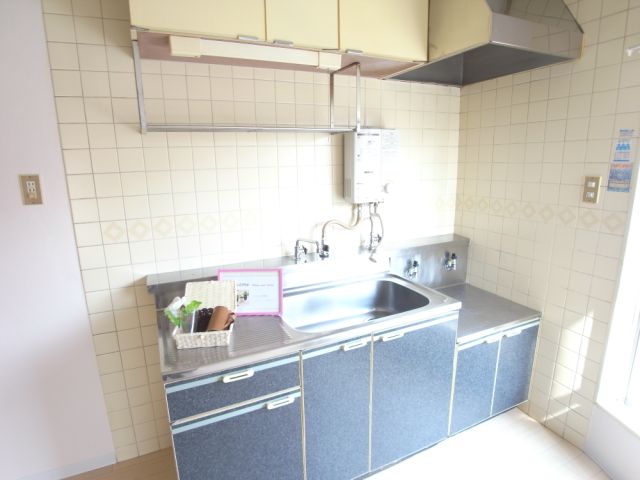 Kitchen. You can put two-burner gas stove. It is bright there is a window in the transverse