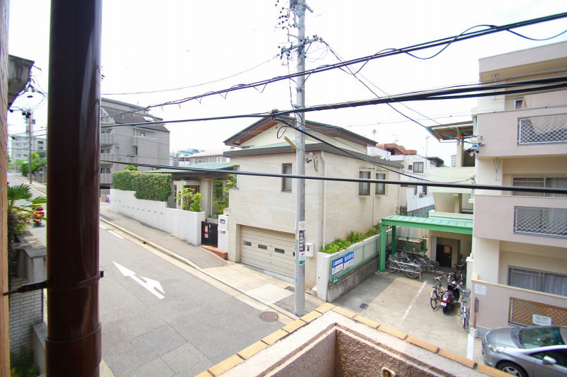 View. This book contains a quiet residential street from the main street.