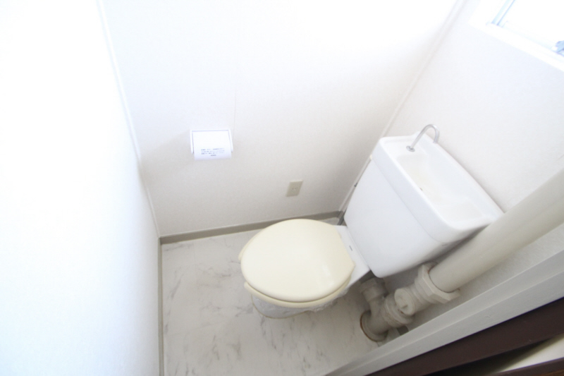 Toilet. It is a photograph of the other rooms