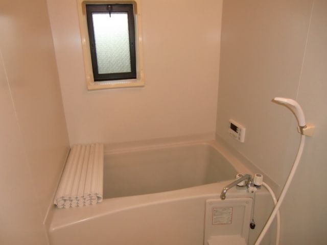 Bath. It is a bathroom with a window may be able to ventilation