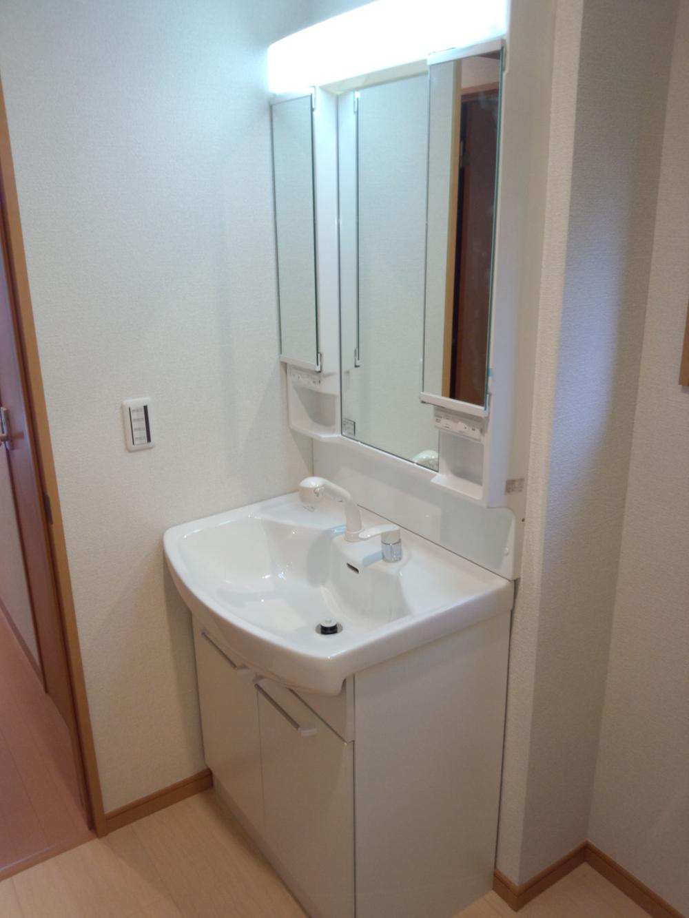 Wash basin, toilet. Happy shampoo dresser in a busy morning!