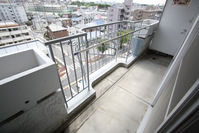 Balcony. Washing machine is put in the back. 