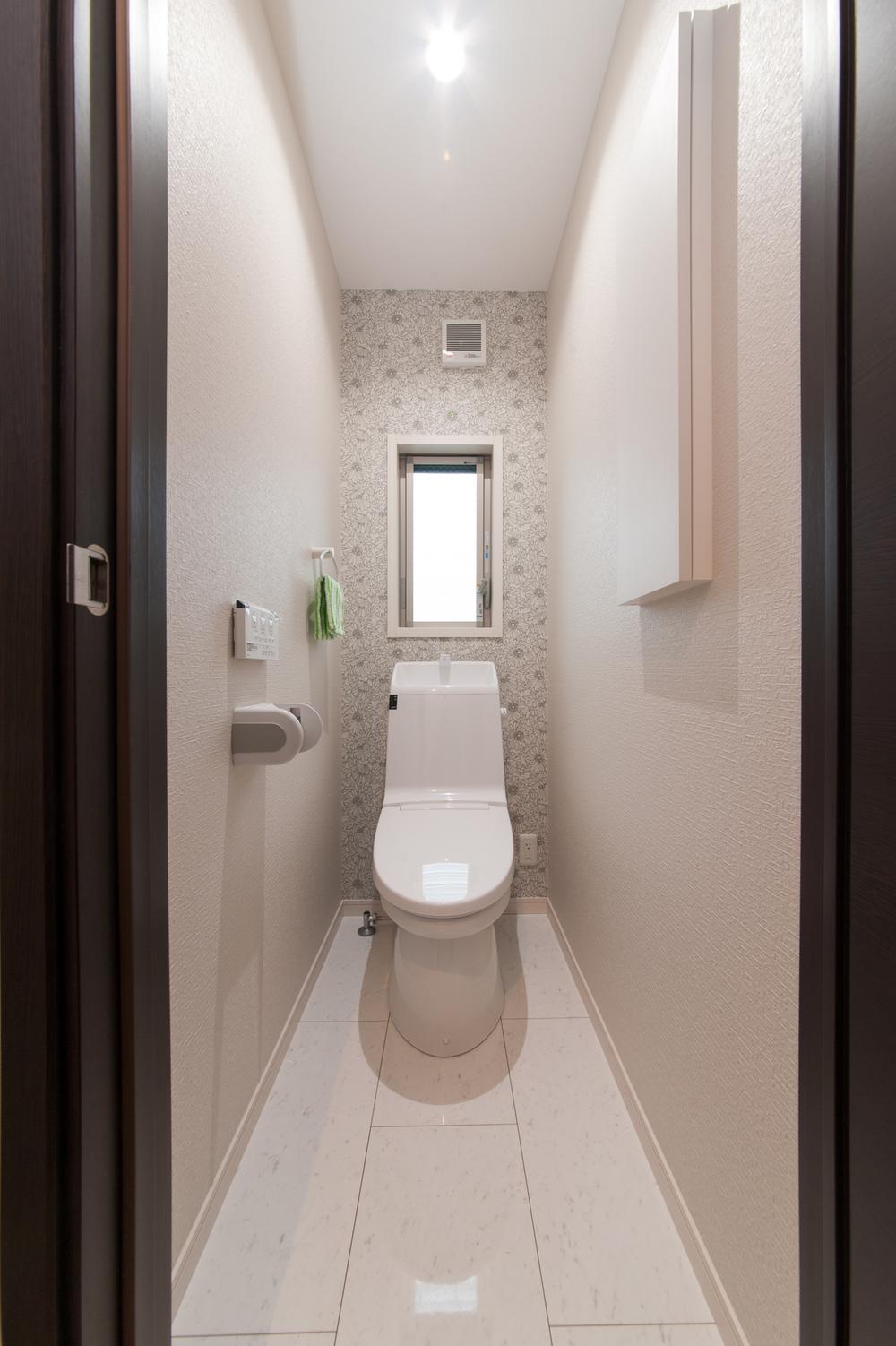 Toilet. Storage rack with toilet
