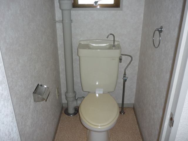 Toilet. There is also a window to the toilet