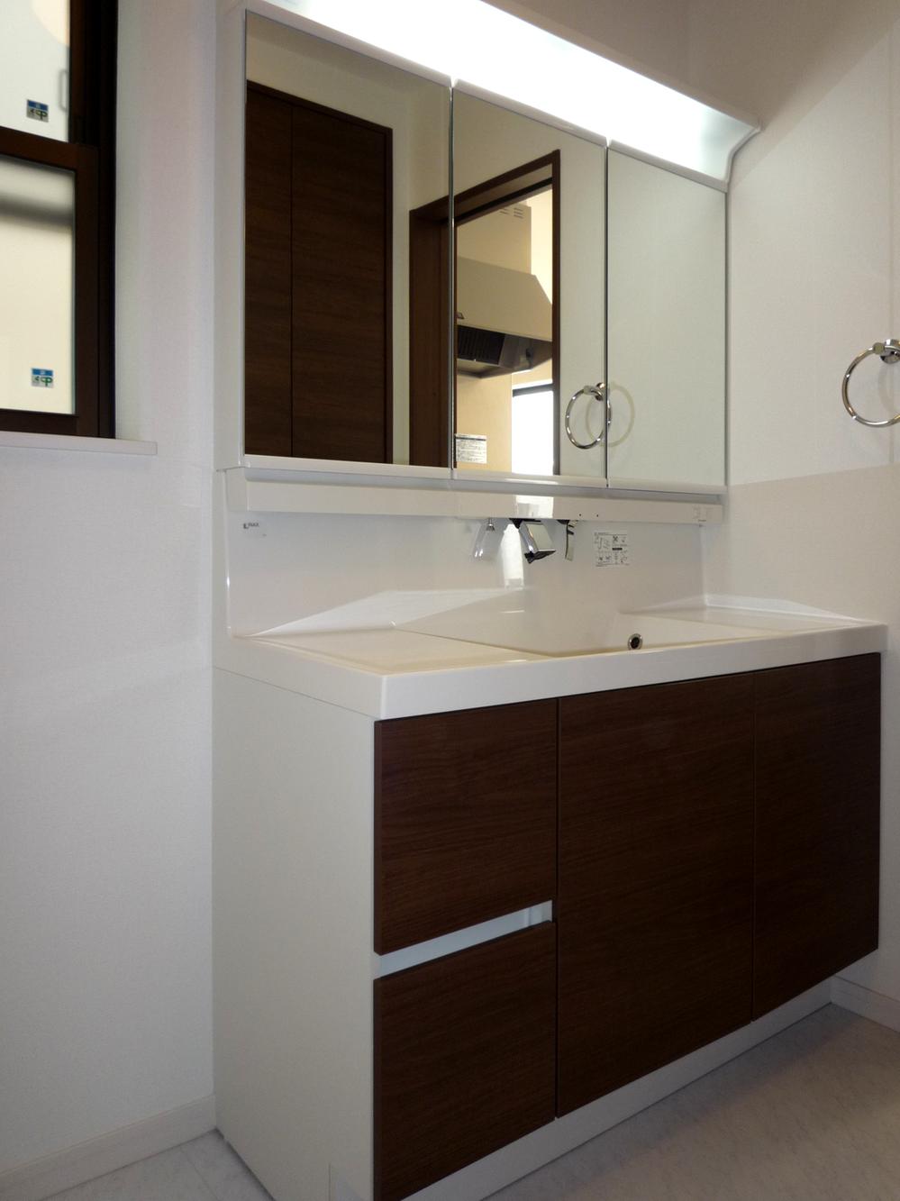 Other Equipment. Standard equipped with a three-sided mirror type in all residence. Easy to clean basin and counter by integrally molded seamless