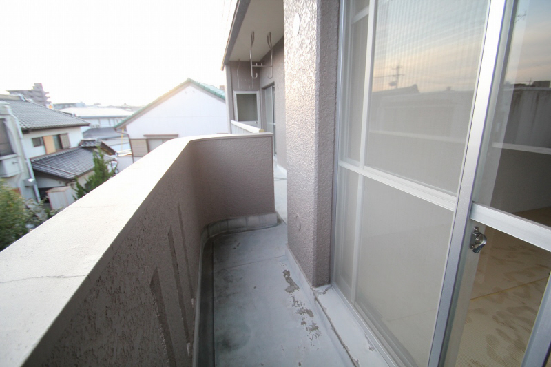 Balcony. It is a veranda with depth.