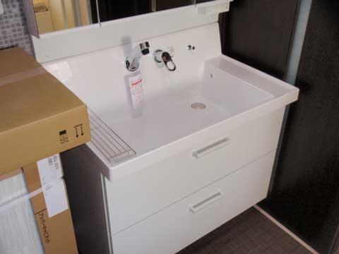 Wash basin, toilet. Wash