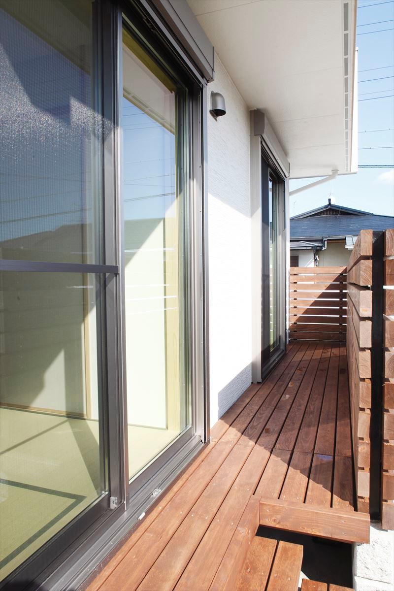 Balcony. It was nestled a small wood deck on the south side of Building B wood deck living.