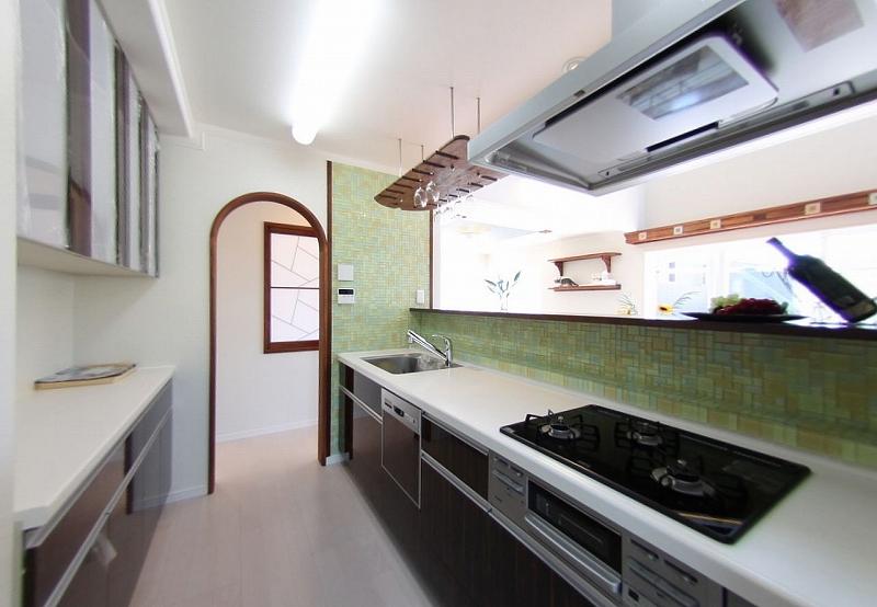 Kitchen. Functional and clean kitchen. We will welcome you in a wine glass over and bar counter.