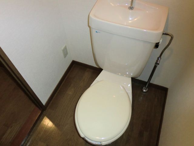 Toilet. With electrical outlet! 