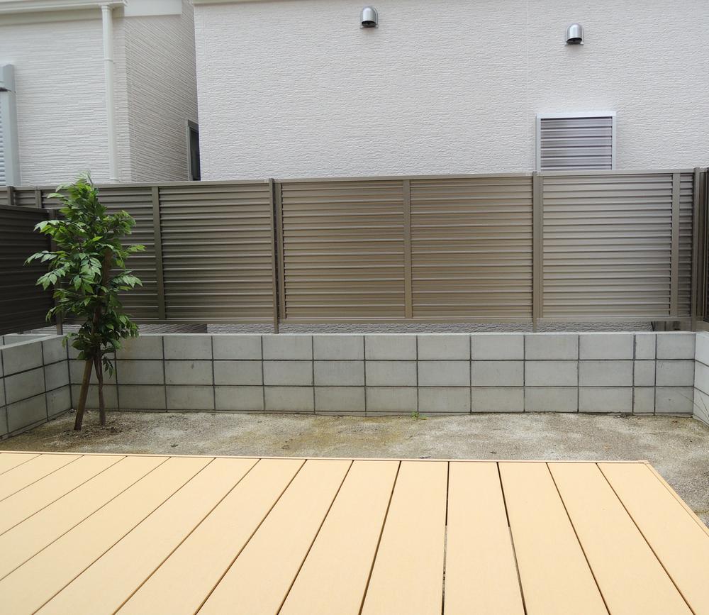 Garden. Wood deck installed in the garden space