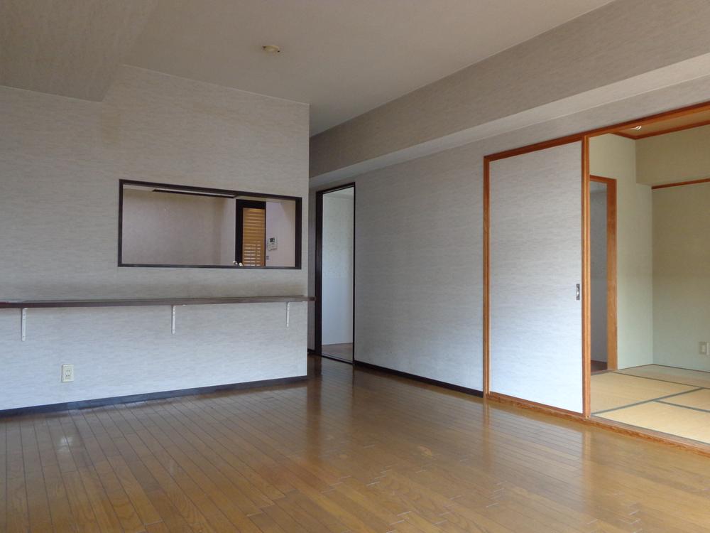 Living. Shoot the kitchen side from the living room