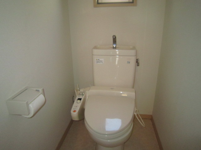 Toilet. Washlet is with