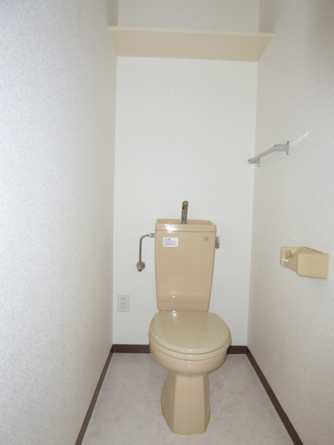 Toilet. Storage is a shelf with toilet ☆