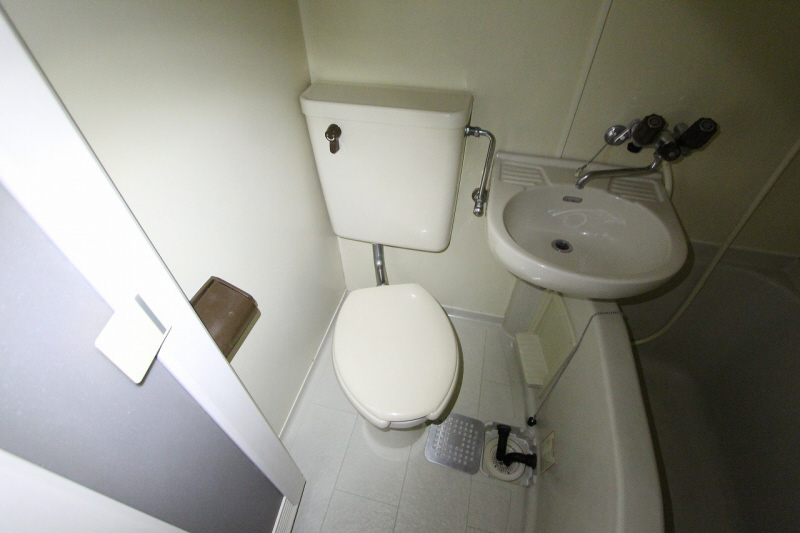 Toilet. It is a photograph of another in Room