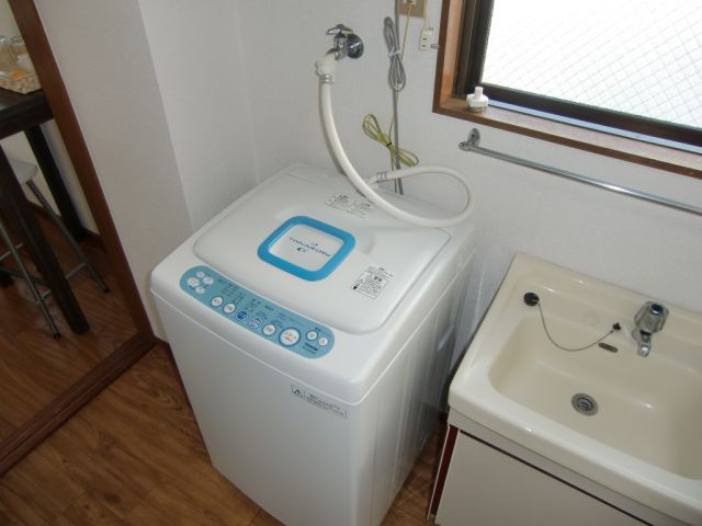 Other Equipment. Wash basin and washing machine installed Zumi