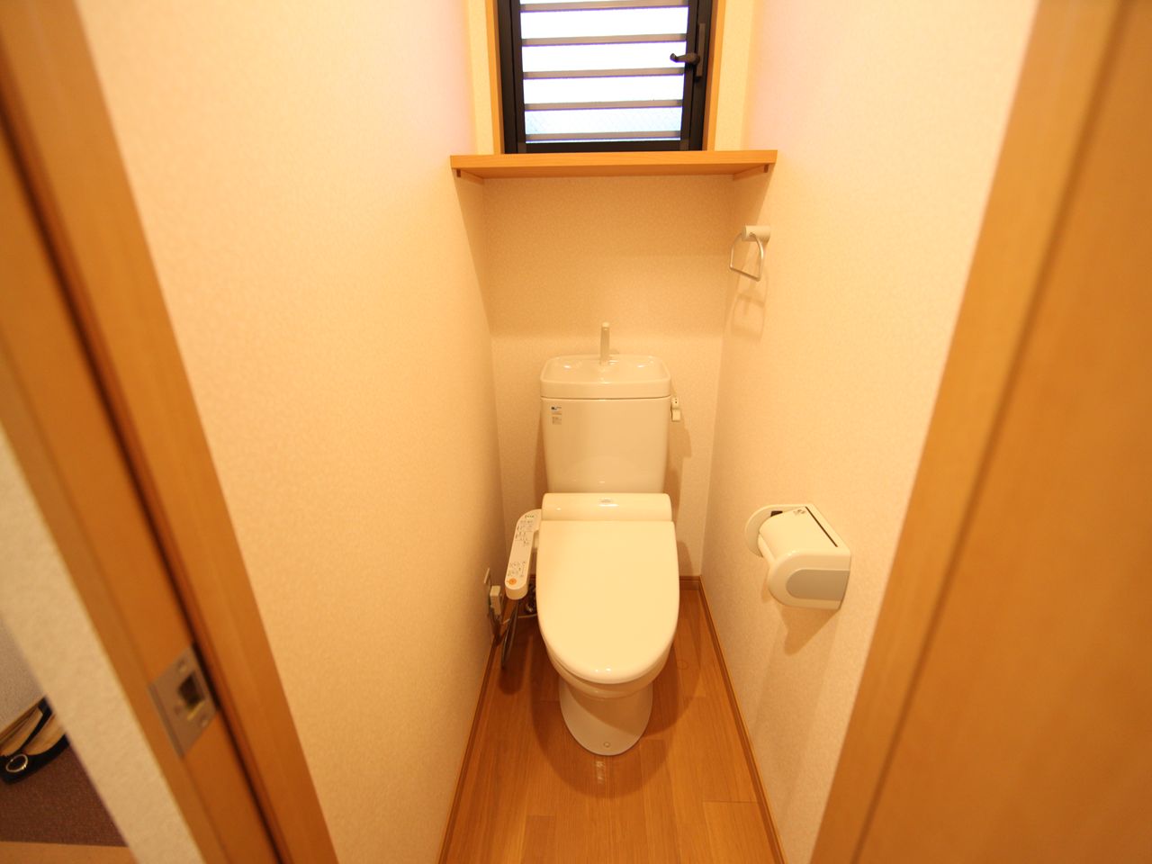 Toilet. Toilet with warm water washing toilet seat With windows (ventilation good)