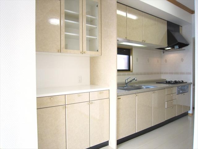 Kitchen. There is a cupboard, Storage is plenty of kitchen.