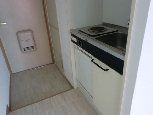 Kitchen. Mini-kitchen with electric stove