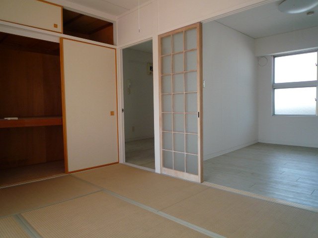 Living and room. In open space by removing the door.