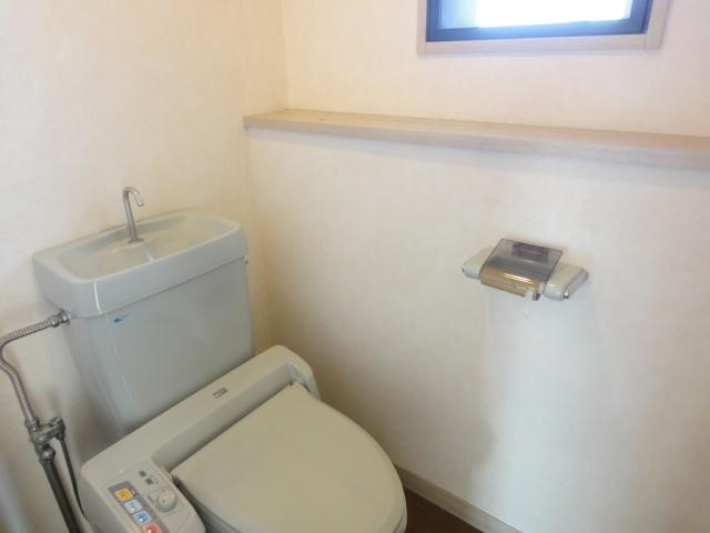 Toilet. Toilet of warm water washing toilet seat. There is a window, It is bright and airy toilet.