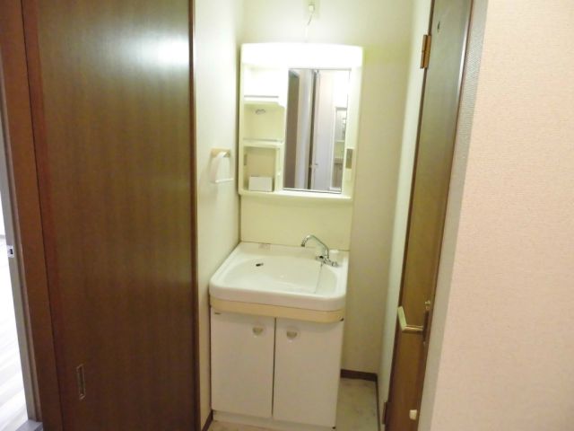 Washroom. Easy to use mirror there is also a large shelf!
