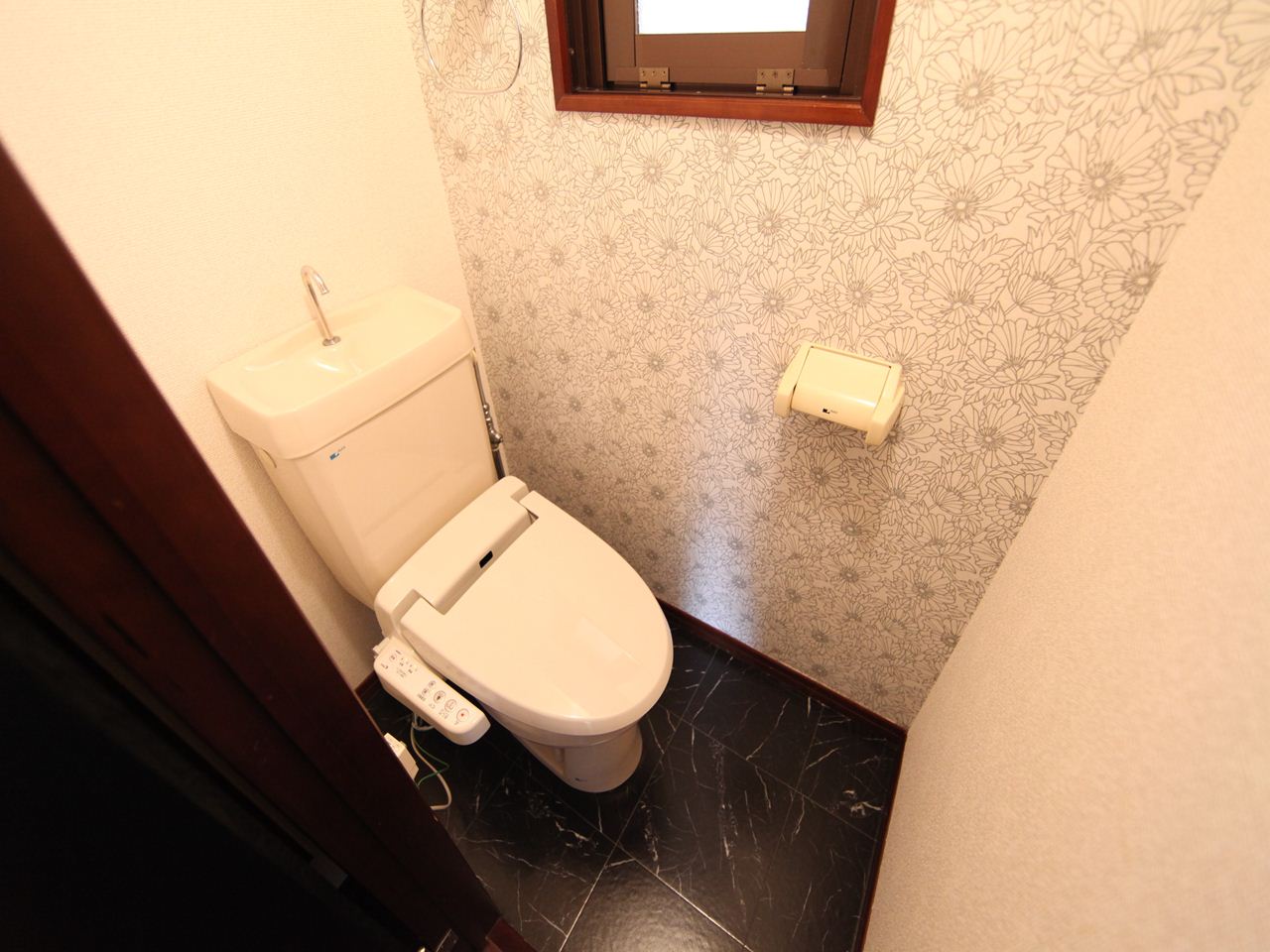 Toilet. Toilet with warm water washing toilet seat With windows (ventilation good)