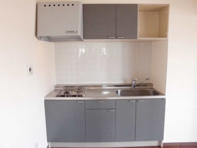 Kitchen. It also available storage shelves at two ports hob