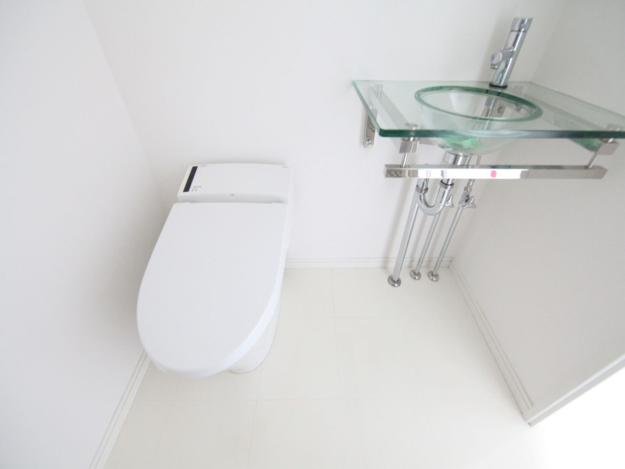Toilet. Toilet with warm water washing toilet seat Stylish washbasin