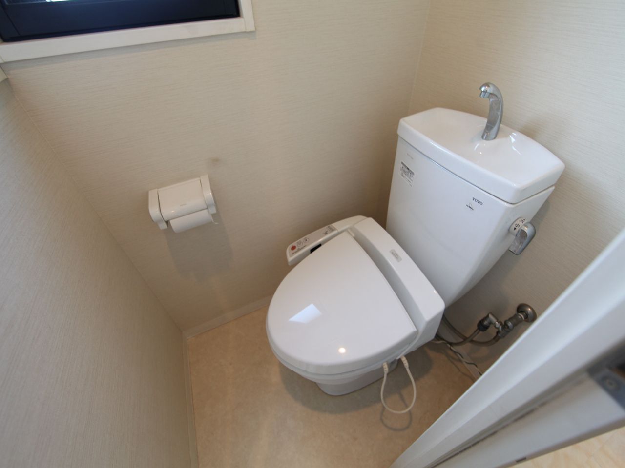 Toilet. Western-style toilet (with warm water cleaning toilet seat)