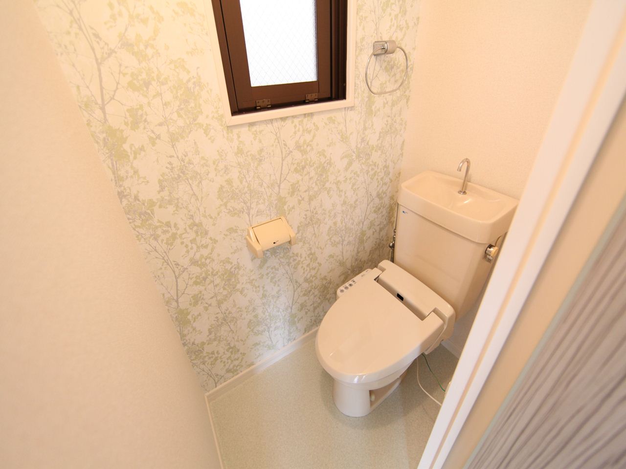 Toilet. Toilet with warm water washing toilet seat With windows (ventilation good)