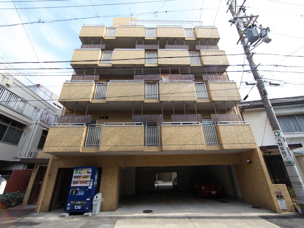 Building appearance. appearance surveillance camera Covered parking Elevator