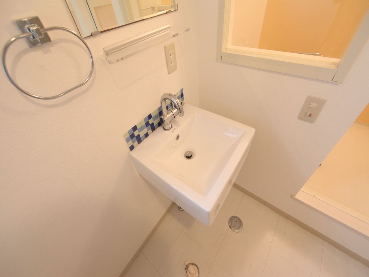 Washroom. Stylish independent washbasin With windows (ventilation good)