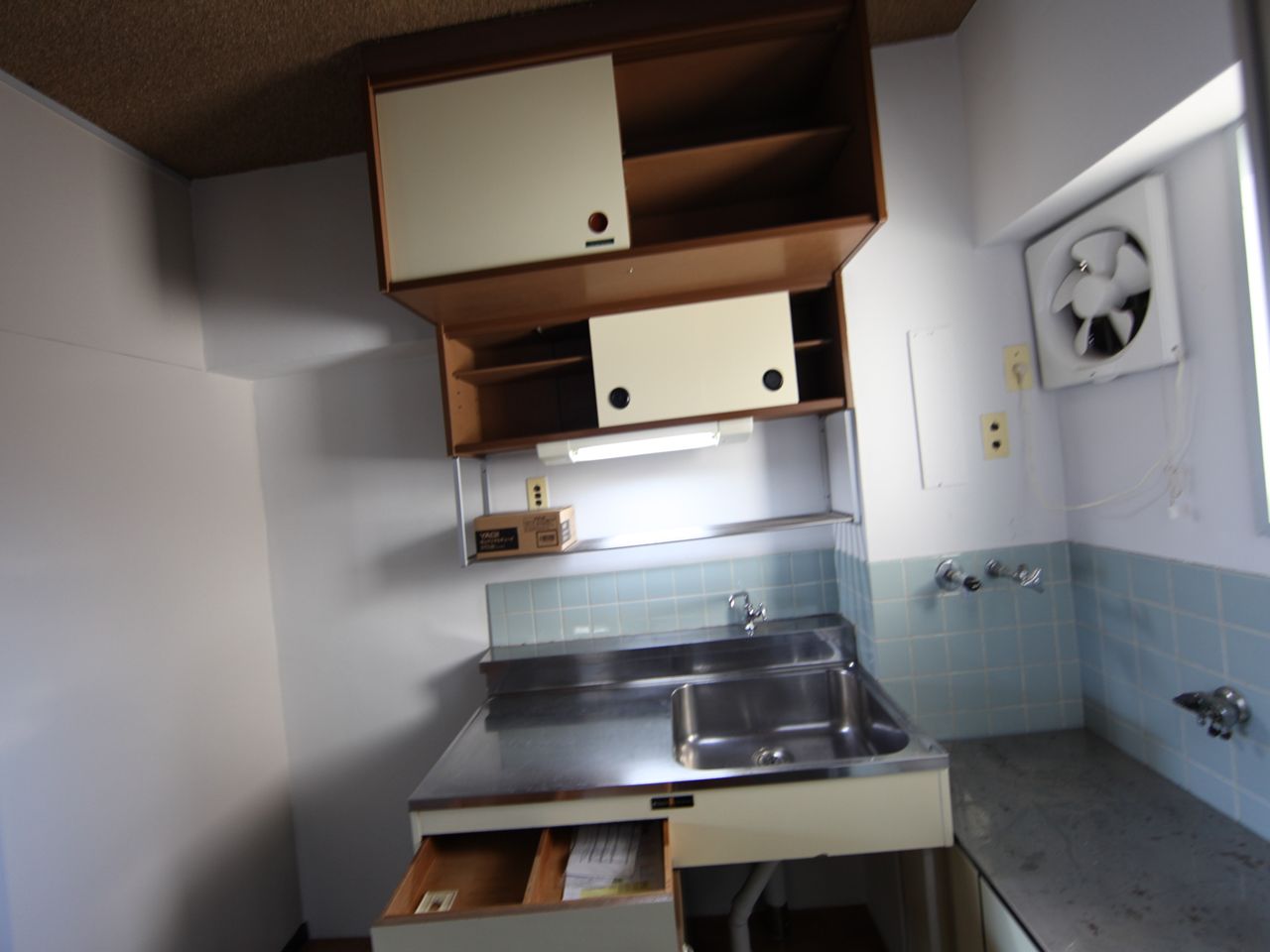 Kitchen. Kitchen (two-burner gas stove installed have) with window (ventilation good)