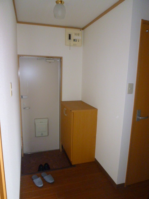 Entrance. With a convenient cupboard