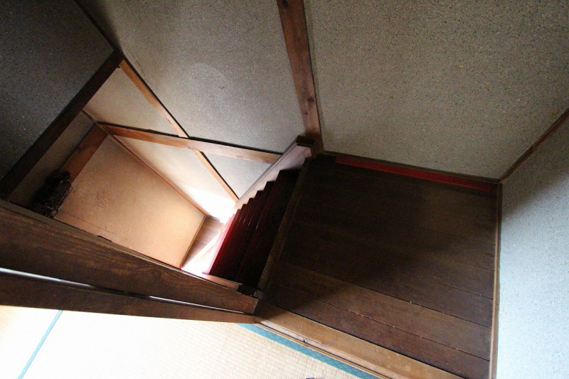 Other room space. There is a staircase next to When I opened the front door. 