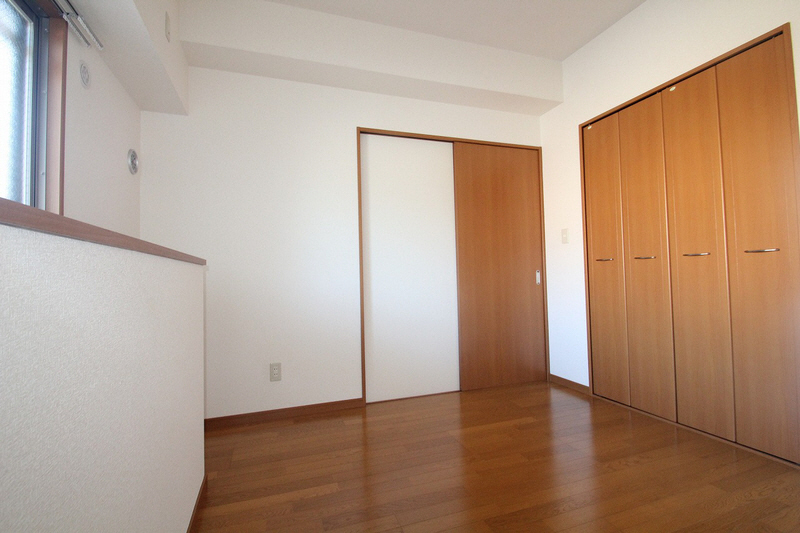 Other room space. It is the bedroom there is a large storage