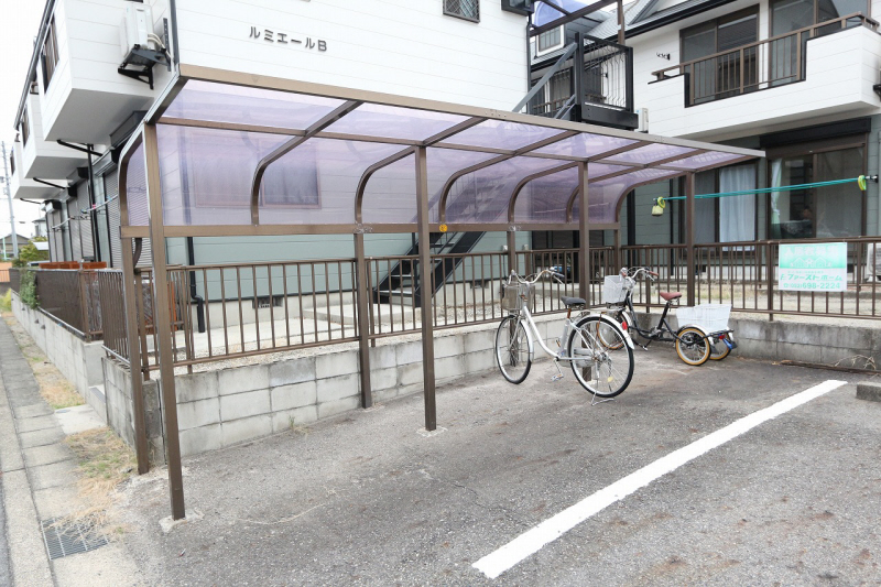 Other common areas. There are bicycle parking lot with a roof. (image)