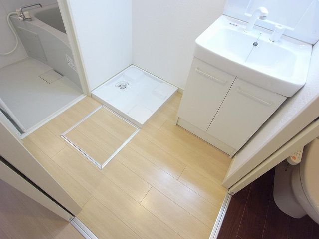 Washroom. Indoor Laundry Storage in undressing space, There is a Bathroom Vanity!