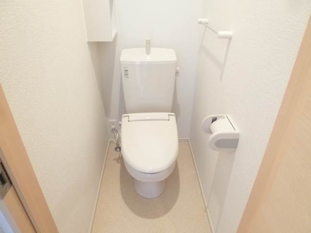 Toilet. Heating toilet seat (The photograph is an image)