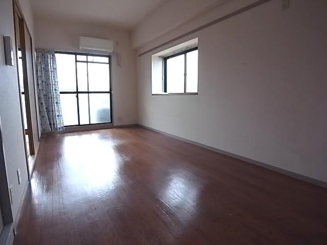 Living and room. Bright living room with south-facing also with bay window! 