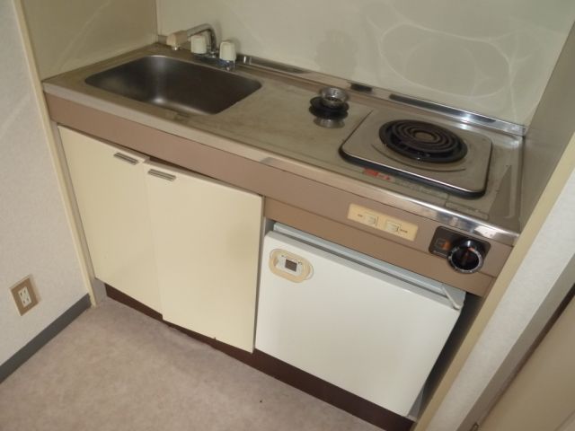 Kitchen. It is with electric stove.