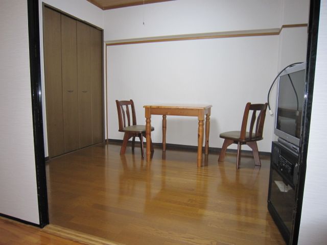 Living and room. Also in the living room until the table and TV.