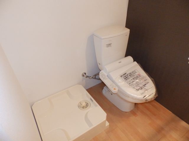 Toilet. There is a sense of openness is the toilet