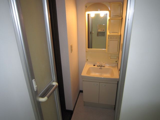 Washroom. There is also a upper closet